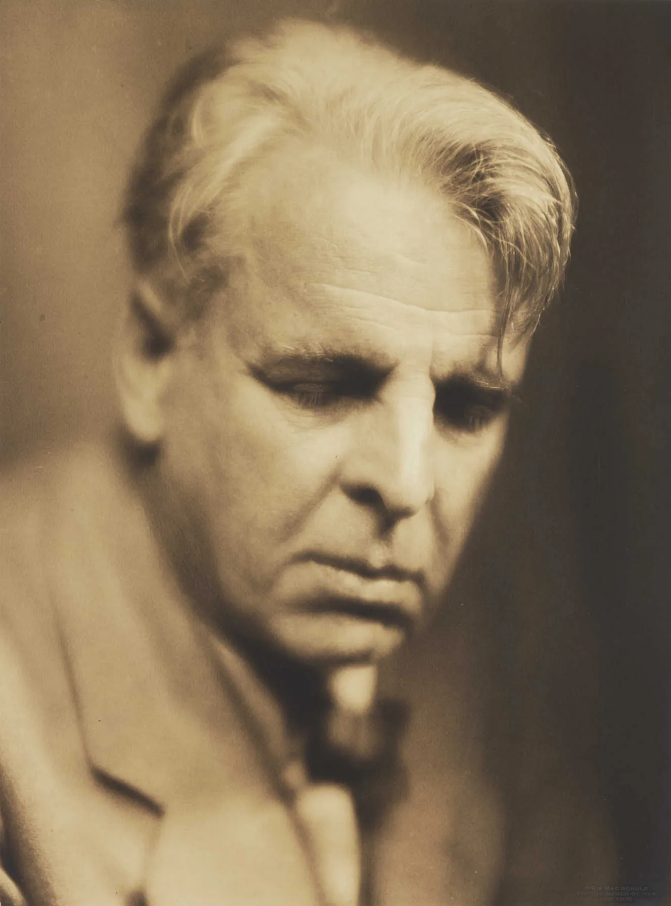 W. B. Yeats by Pirie MacDonald (1933)